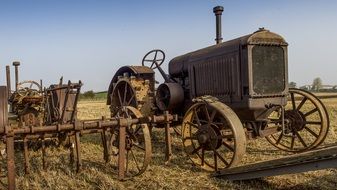 rusty vintage tractor as exhibits