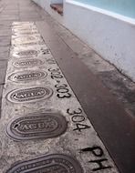 old water pipe hatches on the street in Old San Juan