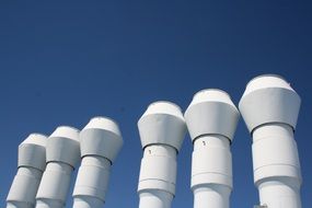 chimneys in the blue sky