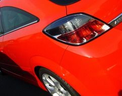 headlight on a red car