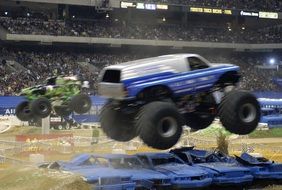 Monsters cars in the stadium arena