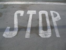 photo of the stop sign on a road