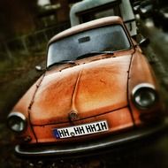 orange car in the garage