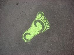 Green footprint on the street