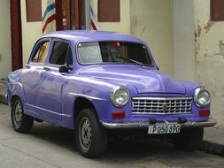 Violet retro car in Cuba