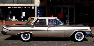 vintage classic car on a city street on a sunny day