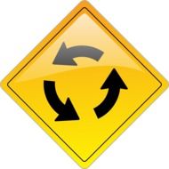 yellow and black sign about ring traffic at white bakground