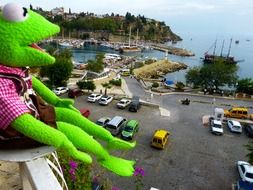 toy frog on the balcony of a building in Antalya