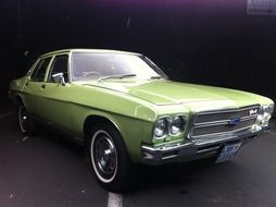 classic green chevrolet car