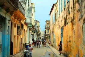 people on old grunge street, cuba, havana