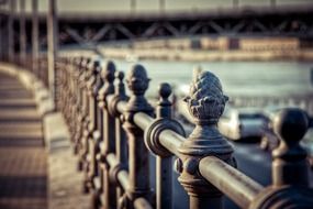 Iron railing on bridge