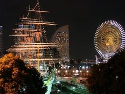 glowing amusement park at night in Japan