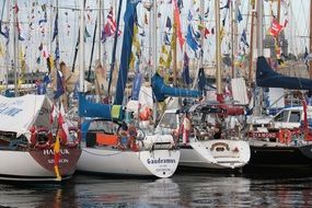 yachts with flags in port