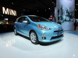 new blue car in showroom