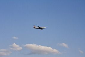 plane in the blue sky