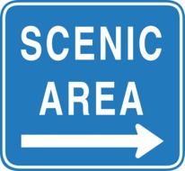 blue sign with pointer