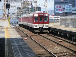 passenger train at railway station platform