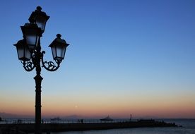 street lamp at dusk in port of italy