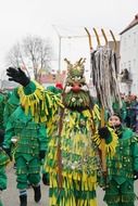 man in neptune costume at street carnival