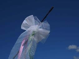 car wedding decorations against the blue sky