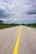 empty highway with yellow markings