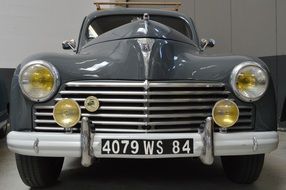 vintage grey car with license plate