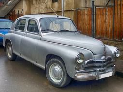 gray car victory stands on the street