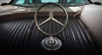 silver logo of a brand mercedes benz