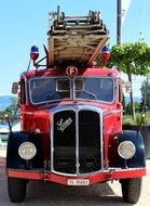 oldtimer fire vehicle with turntable ladder at top