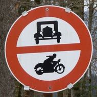 old car and motorcycle road sign