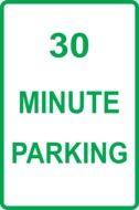 road sign with a message about a parking