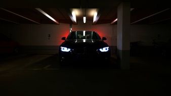 black car in the underground parking lot