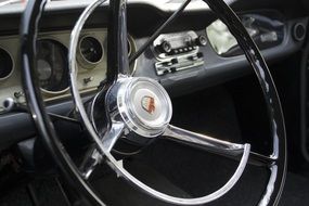 steering wheel in a retro car Ford