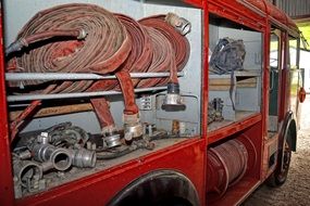 rolled hoses in the fire truck