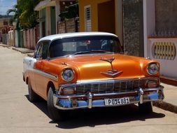 Orange retro car on a street