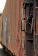 Side view of freight cars of a train