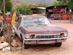 old damaged chevrolet car