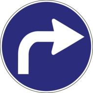 turning arrow on a road sign