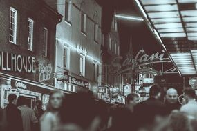 crowd of people on the street at night