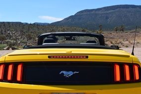 yellow mustang car for travel