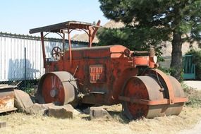 retro steam roller on a farm