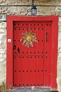 dry big flower on the red front door