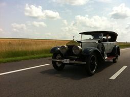 black vintage car on the road