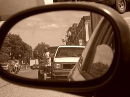 reflection of the cork in the rearview mirror