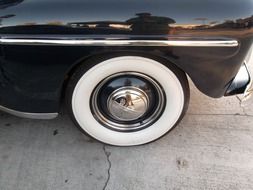 white wheel classic car