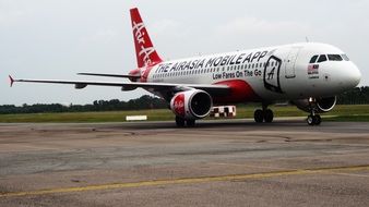 asian airlines plane on the runway