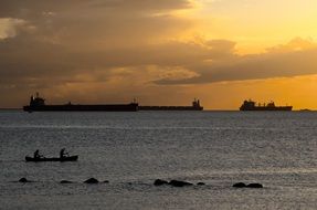 distant view of tankers at sea