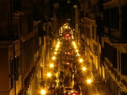 street with lights at night in rome