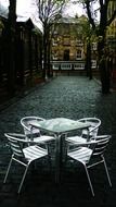 Picture of table and chairs on a street