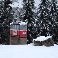 cable car in the winter forest